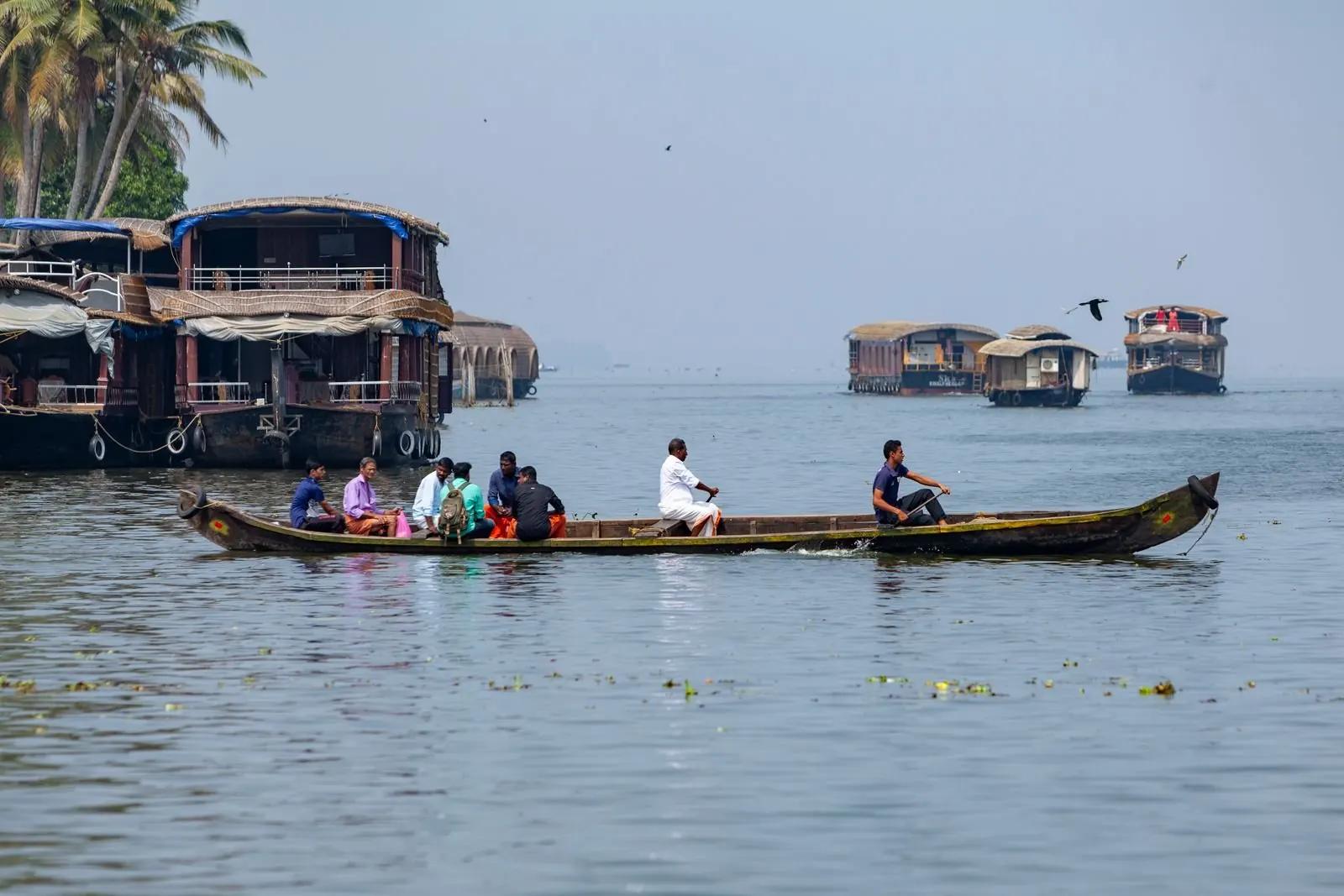 Country boat among houseboats, Alappuzha